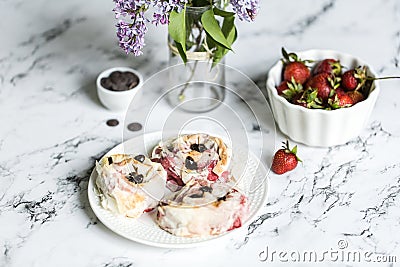 Strawberry rolls with dark chocolate Stock Photo