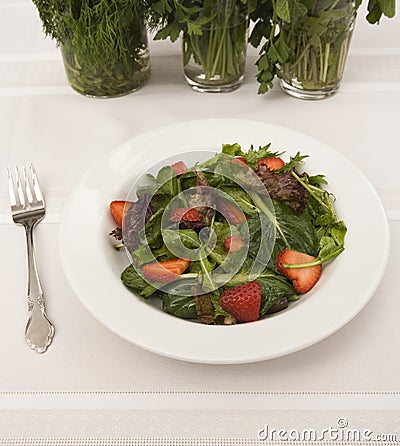 Strawberry salad with fork Stock Photo