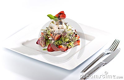 Strawberry salad with fresh goat cheese and mint Stock Photo