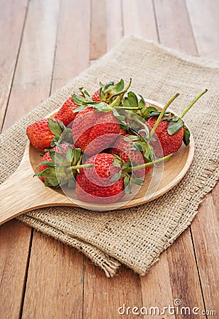 Strawberry shrivel in wooden bowl Stock Photo