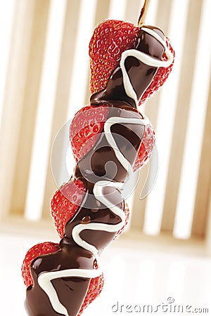 Strawberry skewer with chocolate icing Stock Photo