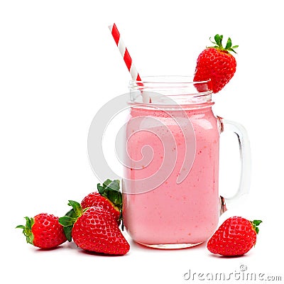 Strawberry smoothie in a mason jar with straw and berries over white Stock Photo