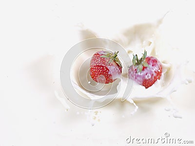 STRAWBERRY SPLASH IN MILK Stock Photo