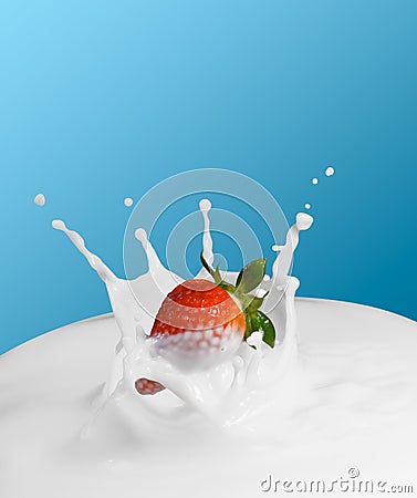 Strawberry splash in milk Stock Photo