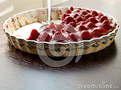 Strawberry tart cake with cream filling and baking mold Stock Photo