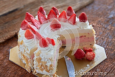 Strawberry And Vanila Ice Cream Cake With Fresh Strawberry Topping On Wooden Table Stock Photo