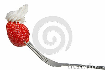 Strawberry with whip in a fork Stock Photo