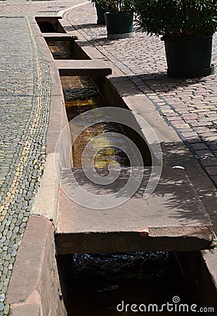 Streamlet in the Old Town of Freiburg in Breisgau, Baden - Wuerttemberg Stock Photo
