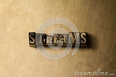 STREAMS - close-up of grungy vintage typeset word on metal backdrop Stock Photo