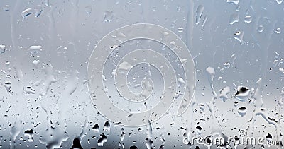 Streams of raindrops on window glass Stock Photo