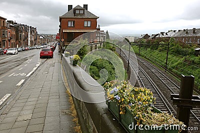 Street along railway in Namur, Belgium Stock Photo