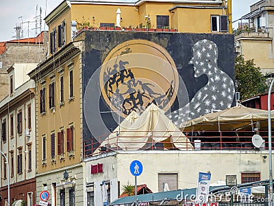 Street art of a black silhouette dressed in stars looking at a sphere to Rome in Italy. Editorial Stock Photo