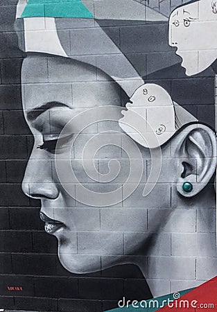 Street art graffiti of beautiful face Editorial Stock Photo