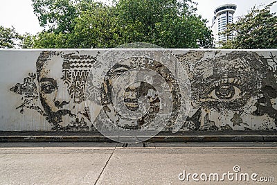 Street art graffiti outside the Portuguese embassy in Charoen Krung, Bangkok Editorial Stock Photo