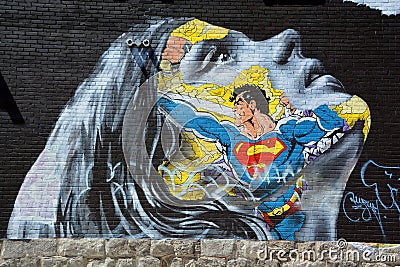 Street art Montreal Superman and woman Editorial Stock Photo