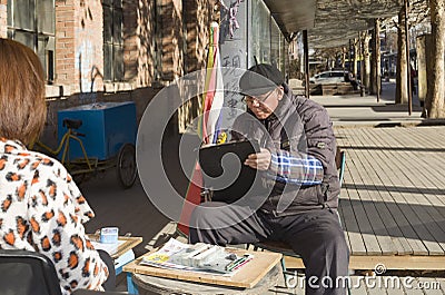 A street artist Editorial Stock Photo