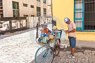 Street artist with two little dogs at Old Havana Editorial Stock Photo