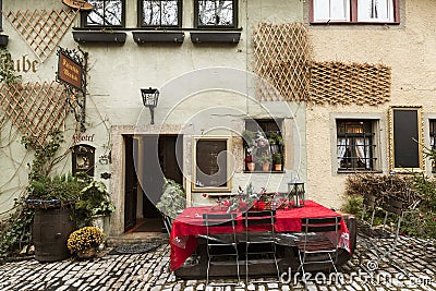 Street cafe during the Christmas holidays in Rotenburg ob der Tauber. Bavaria Editorial Stock Photo