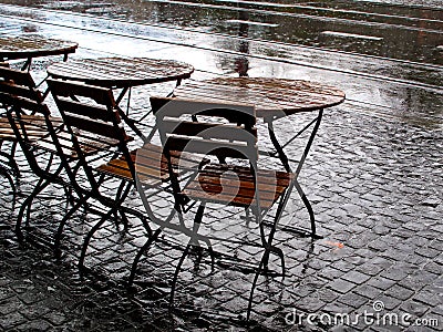 Street cafe in rainy weather Stock Photo