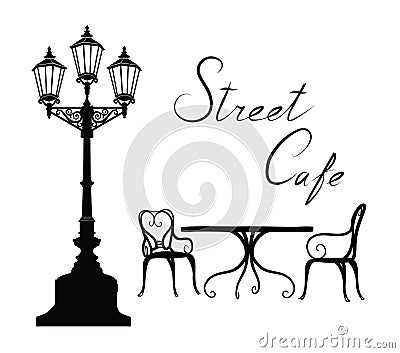 Street cafe - table, chairs, streetlight and lettering City life Stock Photo