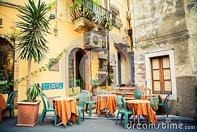 Street cafe in Taormina Stock Photo