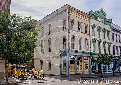 Group of taxi bicycles on a street in downtown Charleston Editorial Stock Photo