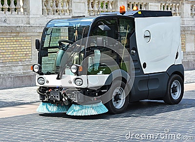 Street cleaner vehicle at work Editorial Stock Photo