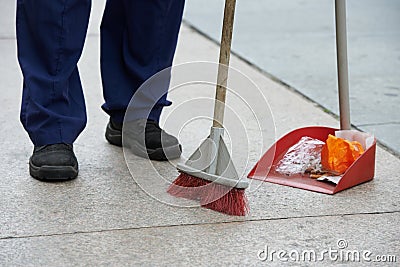 Street cleaning and sweeping with broom Stock Photo