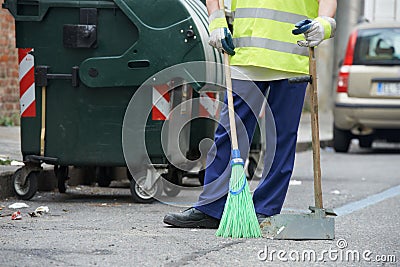 Street cleaning and sweeping with broom Stock Photo