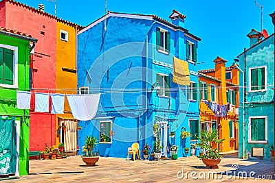 Street with colorful houses in Burano Stock Photo