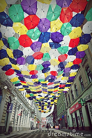 Street decorated with colored umbrellas. Editorial Stock Photo