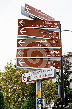 street direction sign to landmarks in old Tbilisi Editorial Stock Photo