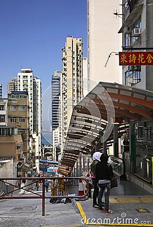 Street and escalator in Hong Kong. China Editorial Stock Photo