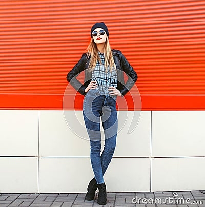 Street fashion concept - stylish hipster woman in rock Stock Photo