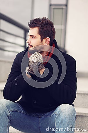 Street fashion, handsome brunet man Stock Photo