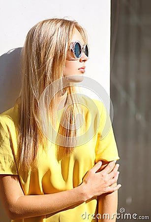 Street fashion photo, stylish pretty hipster girl in sunglasses Stock Photo