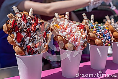 Street food ice cream with waffles closeup in outdoor cafe Stock Photo