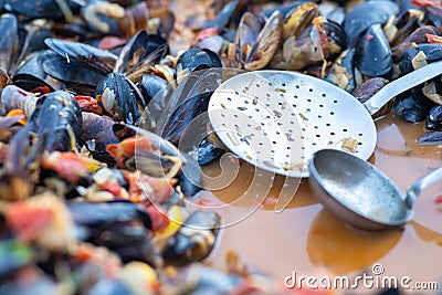 Street food of Mussels with vegetables Stock Photo