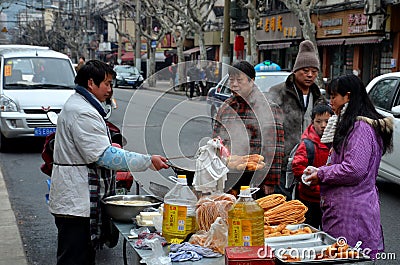 Street food stall and customers Shanghai China Editorial Stock Photo