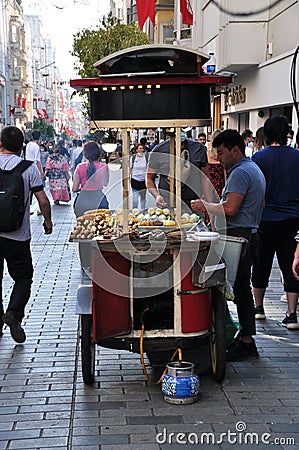 Street food on the streets of Istanbul. Kiosk selling corn and roasted chestnuts. Editorial Stock Photo