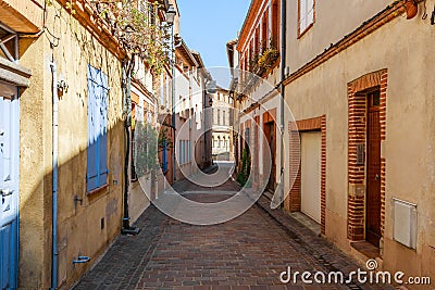 Street in French ancient town Toulouse. Toulouse is the capital of Haute Garonne department and Occitanie region, France, South Stock Photo