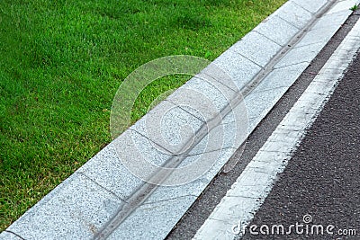 Street gutter of a stormwater drainage system. Stock Photo