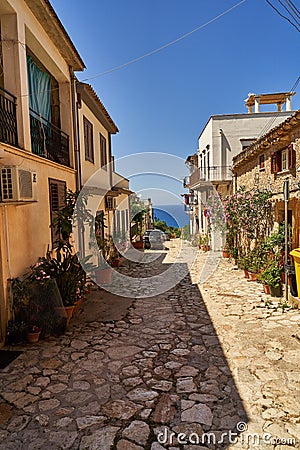 Street between houses facing the sea on a sunny morning Editorial Stock Photo