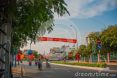 Street with huge traffic, lots of motorcycles. Nha Trang, Vietnam. Editorial Stock Photo