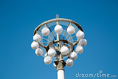 Street lamp Circles Round white lampshades. Landscaping Stock Photo