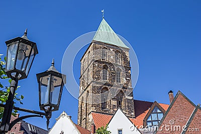 Street light and church tower in Rheine Stock Photo