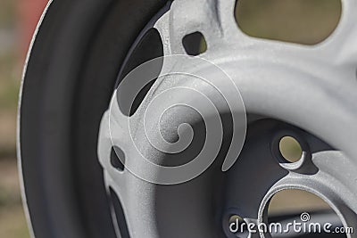 street lighting. car wheels made of iron. treated with sandblasting. metal without painting. close-up Stock Photo