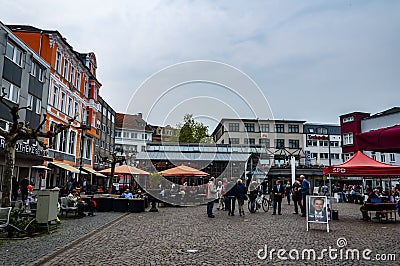 Street with many bars, restaurants, pizzeria and coffee shops in Herford Editorial Stock Photo