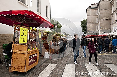 A street market in Montmartre, Paris Editorial Stock Photo