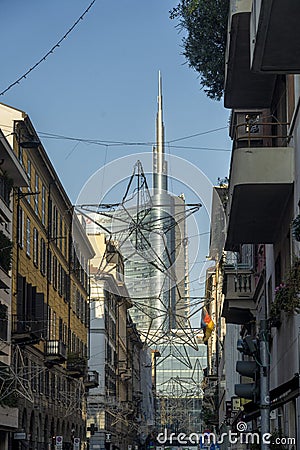 Street of Milan, Italy, with Unicredit tower Stock Photo